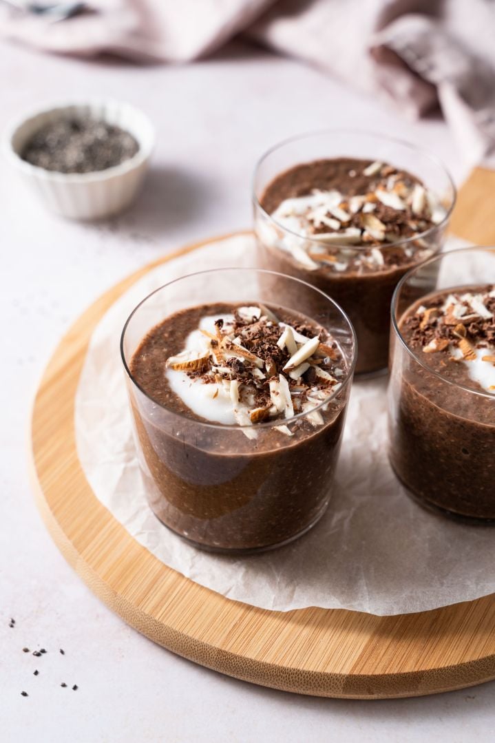 chocolate pudding made with chia seeds and served in small glass jars