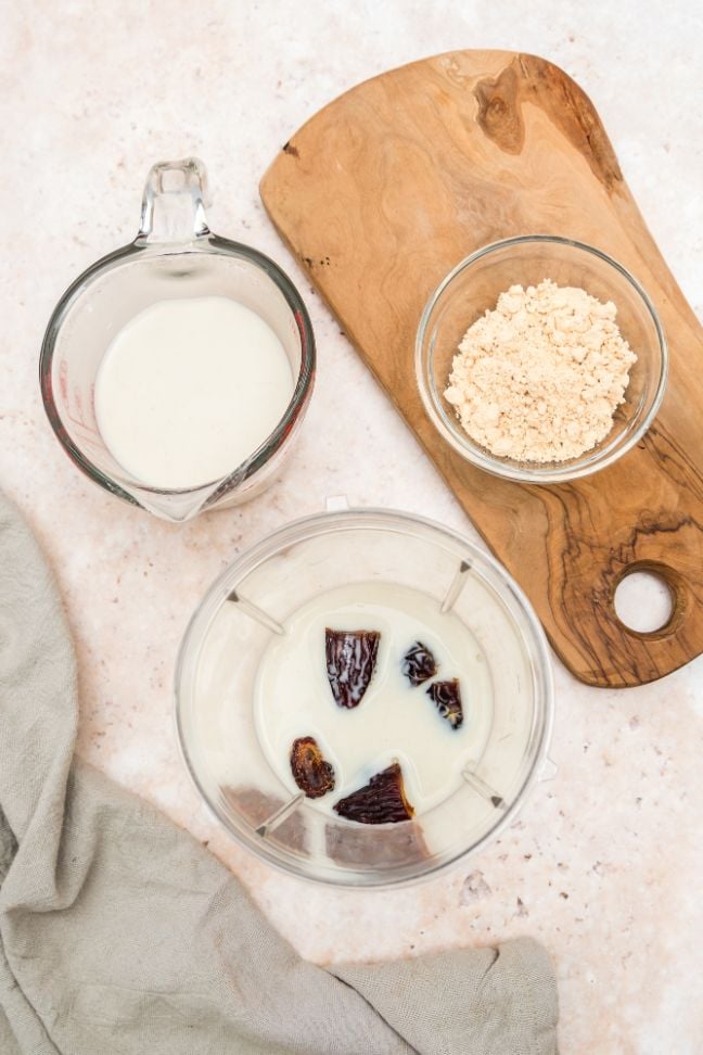 Dates and milk in a blender jug