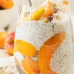 Ripe apricot slices arranged in a glass with chia pudding