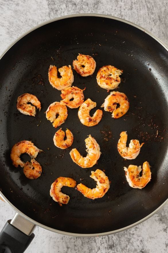 Cook the shrimp in a large saucepan over medium heat