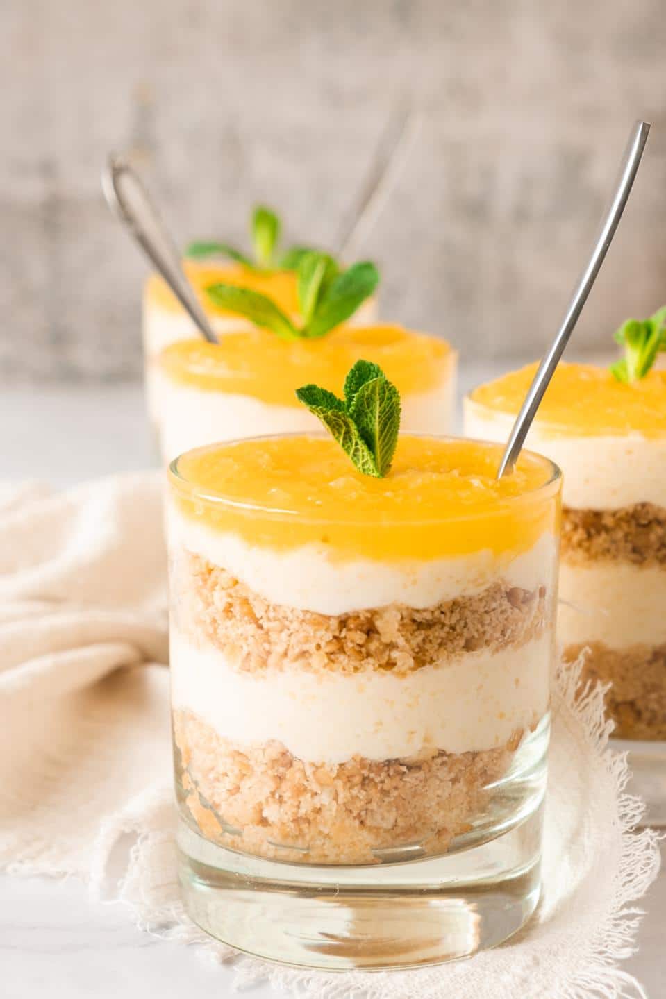 Pineapple cheesecakes served in individual glasses